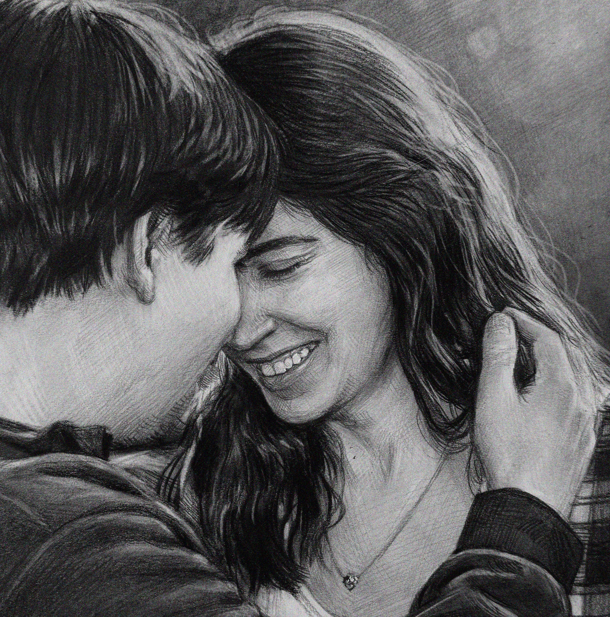 A detailed, close-up black and white pencil drawing of an intimate embrace between a happy man and woman. Their foreheads are touching, and the smiling woman, her eyes closed in joy, has her long wavy hair gently held by the man's hand. The drawing style uses soft charcoal or graphite shading on a textured paper surface. Both subjects are casually dressed and looking lovingly towards each other. The background is softly blurred.