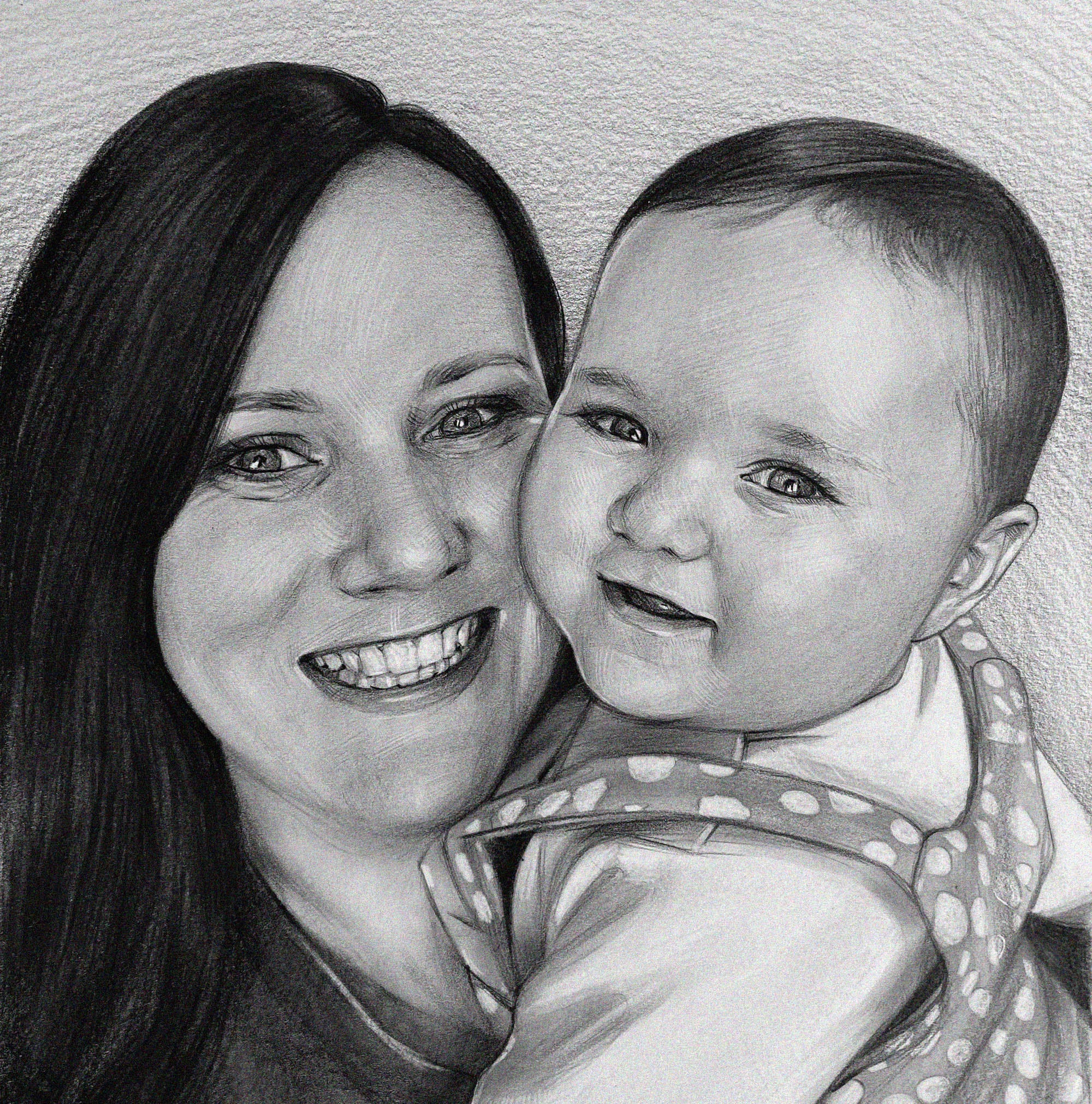 A realistic black-and-white sketch portrait of a woman and a baby, drawn with a graphite pencil. The woman, with long dark hair, is smiling broadly, showing her teeth as she leans her face close to the child. The infant, with sparse hair and large eyes, looks at the viewer with a slight smile, dressed in a spotted onesie. The portrait captures a tender moment and the details of the paper’s texture and pencil hatching.